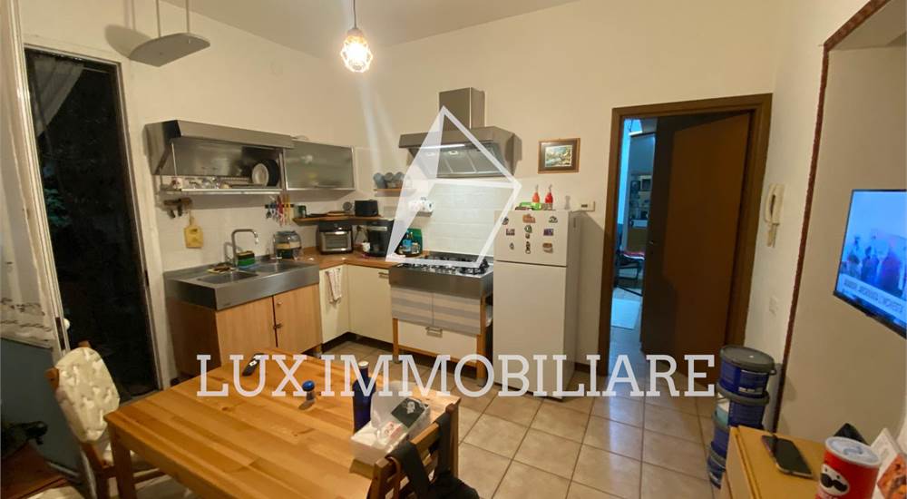 Sala con cucina