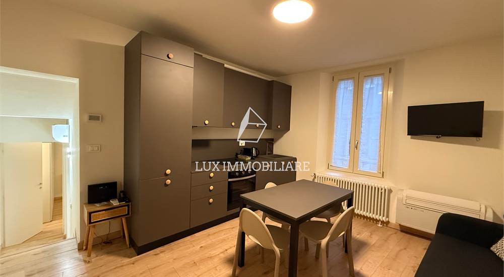 Soggiorno con cucina a vista