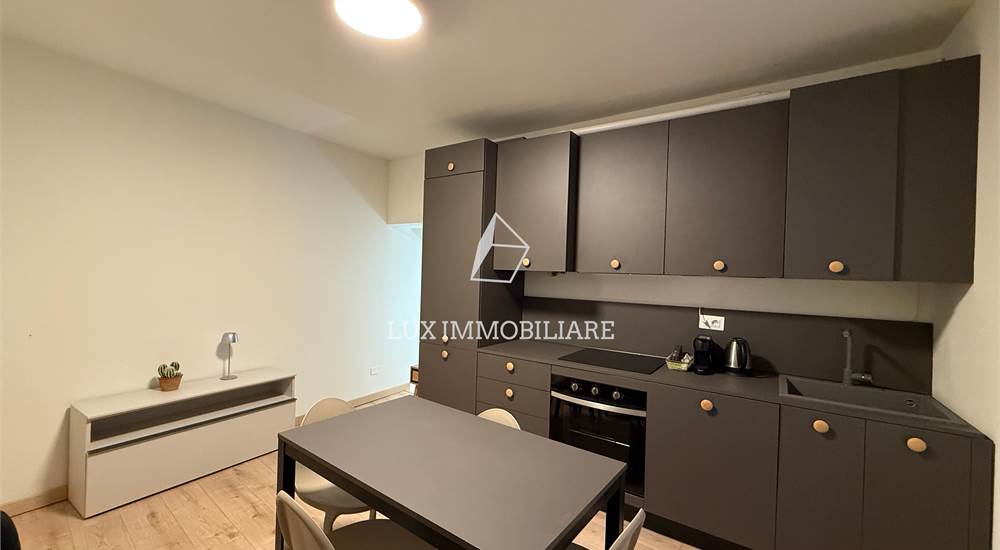 Soggiorno con cucina a vista