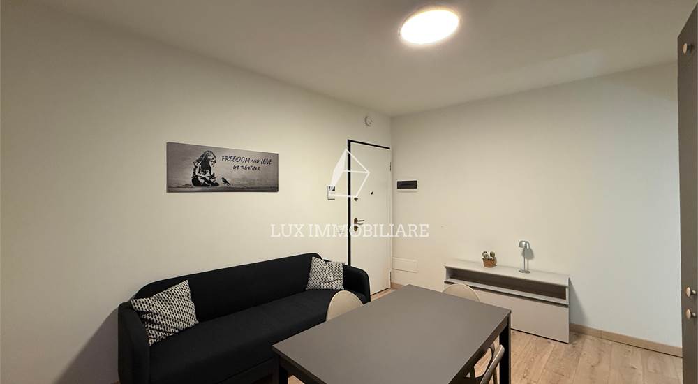 Soggiorno con cucina a vista