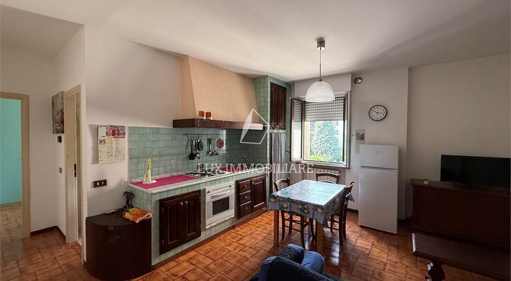 Soggiorno con cucina a vista