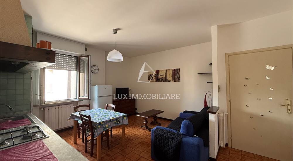 Soggiorno con cucina a vista