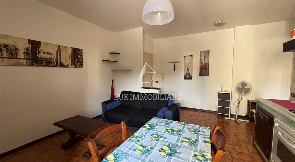 Soggiorno con cucina a vista