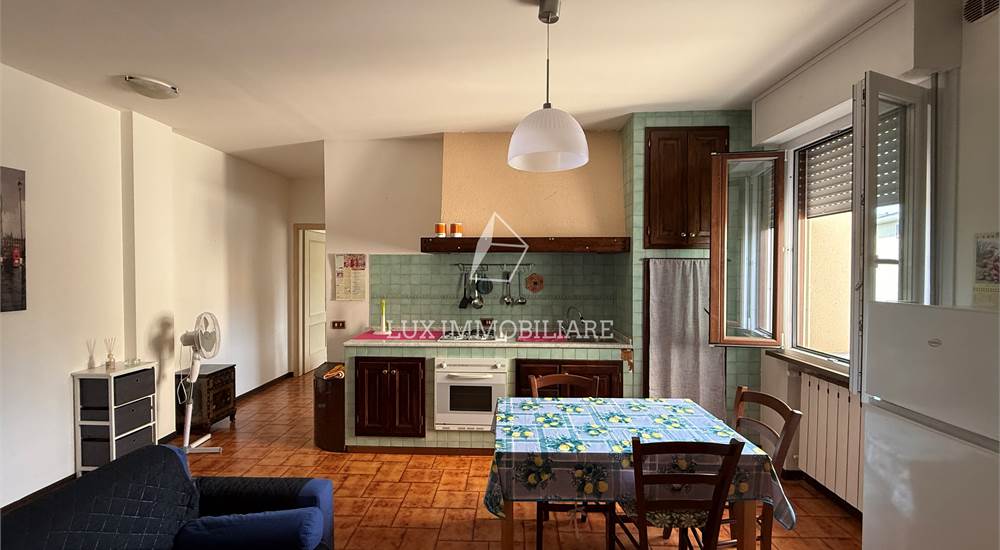 Soggiorno con cucina a vista