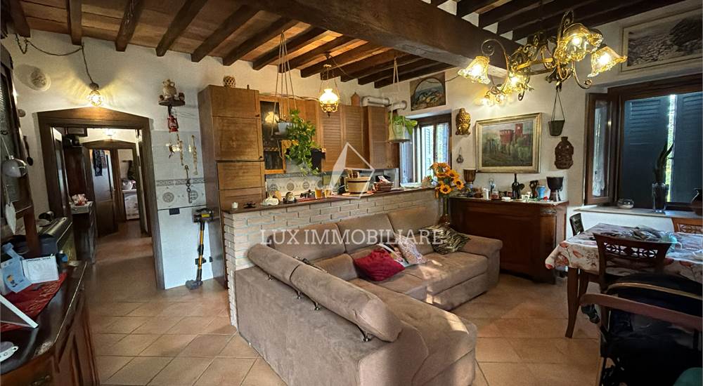 Soggiorno con cucina a vista