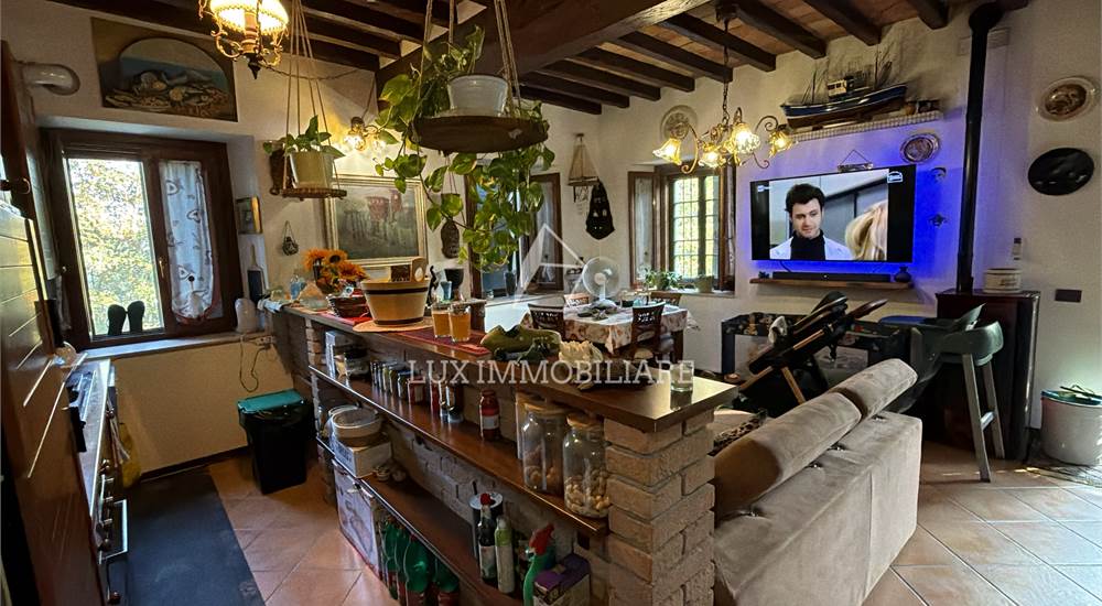 Soggiorno con cucina a vista