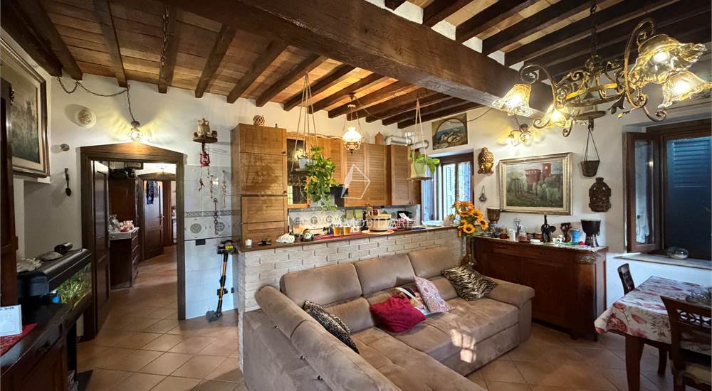 Soggiorno con cucina a vista