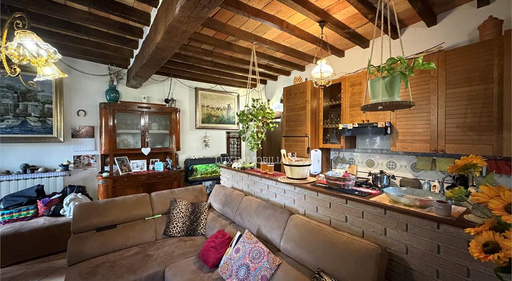Soggiorno con cucina a vista