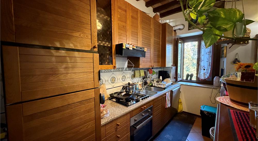 Soggiorno con cucina a vista