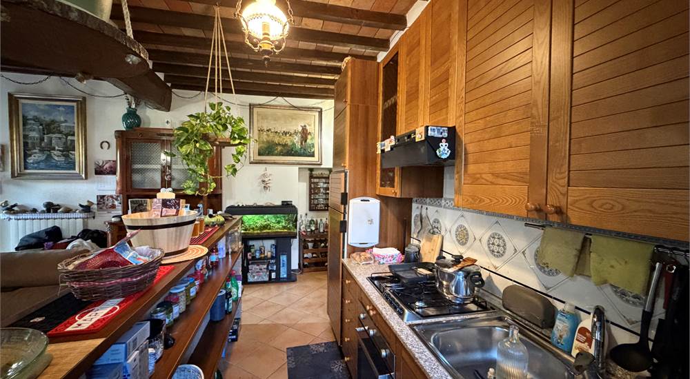 Soggiorno con cucina a vista